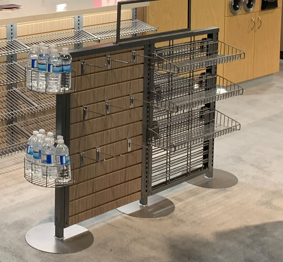 Queue line merchandising system